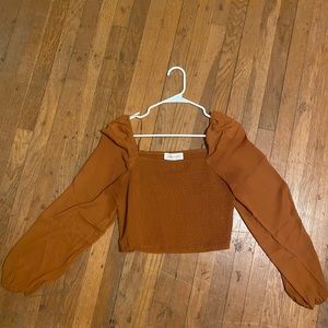 Orange ruched crop top. Never worn.